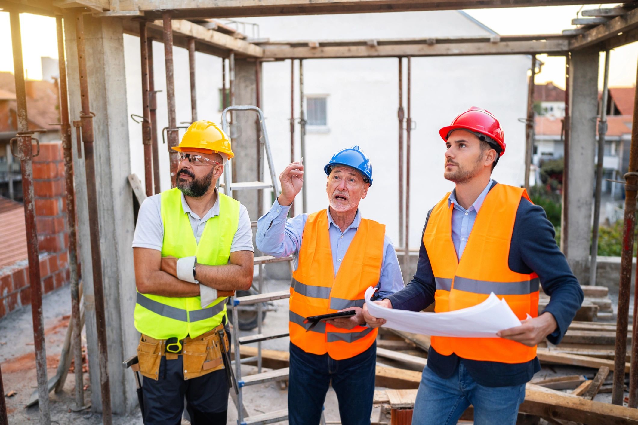 Construction team reviewing plans on a jobsite