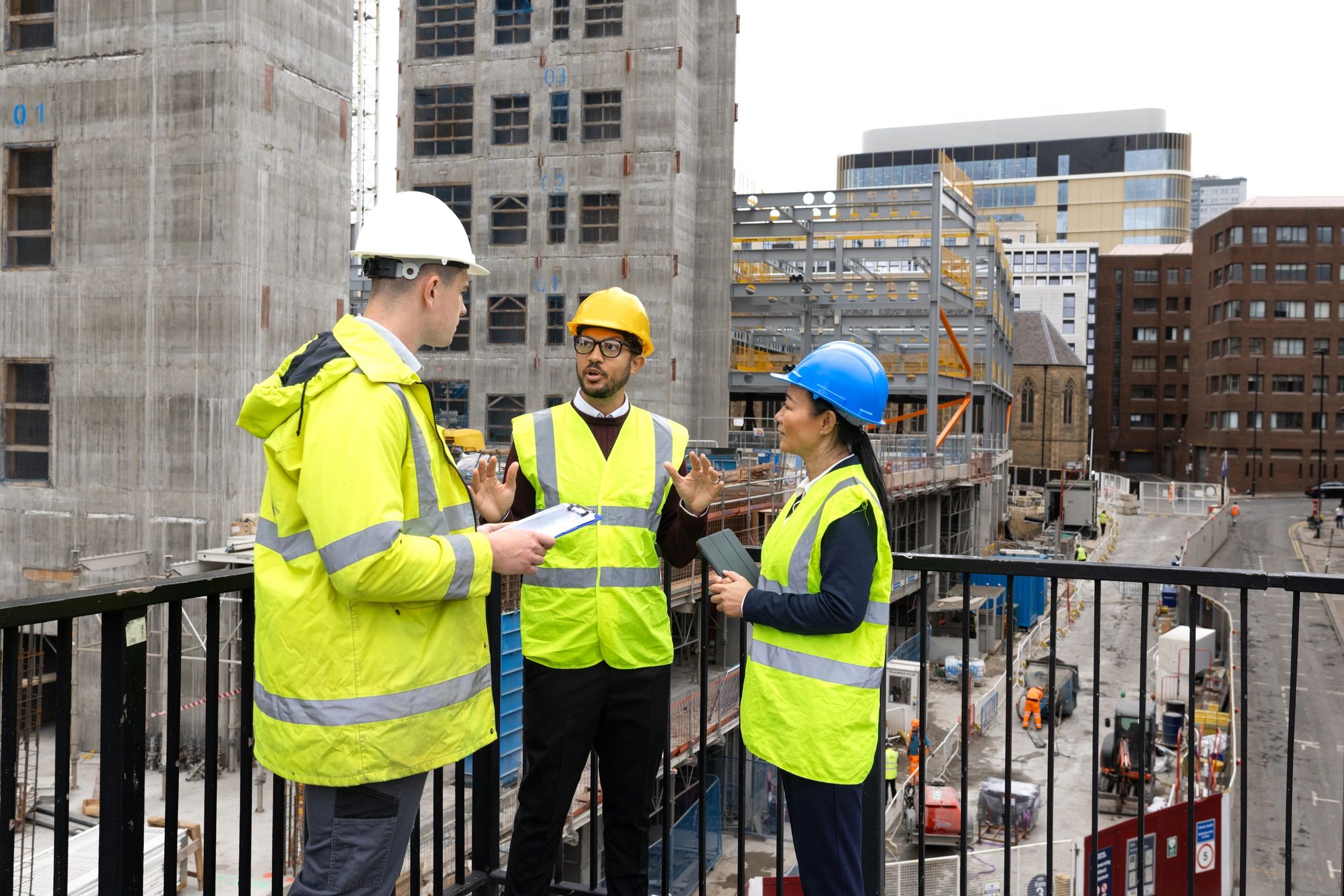 Construction crew reviewing plans at a jobsite