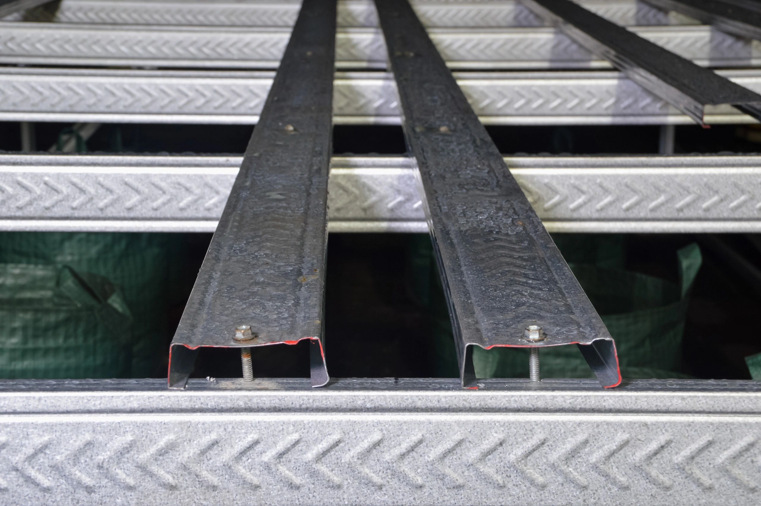 Close-up of galvanized steel channel framing bolted together