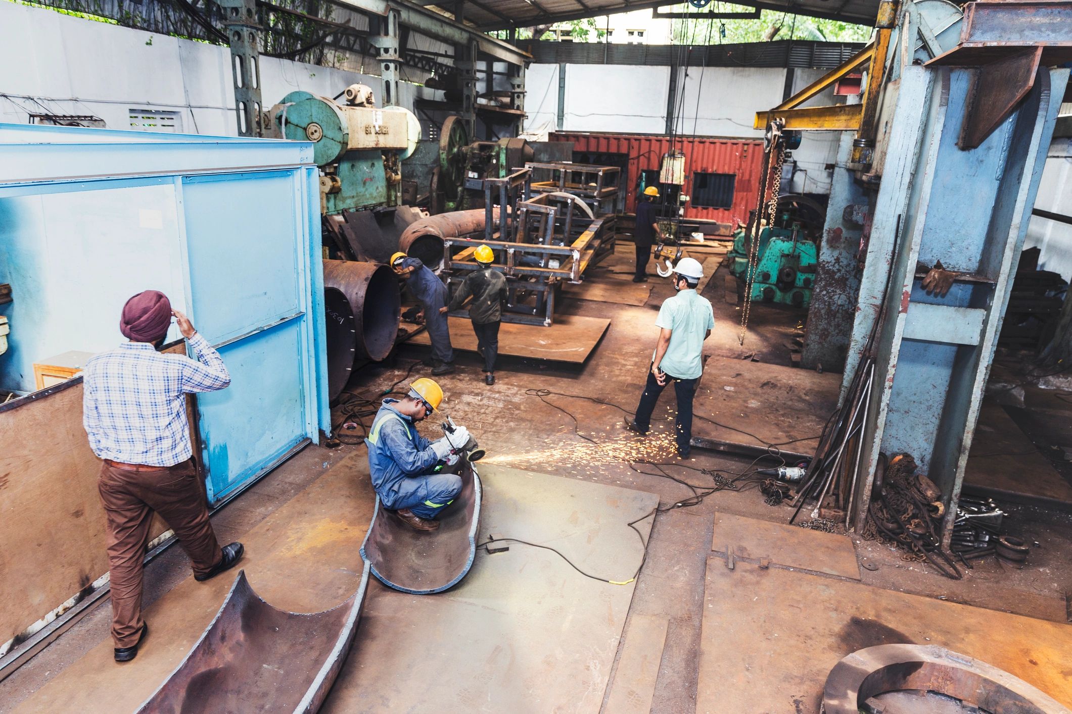 Team working in a steel fabrication facility